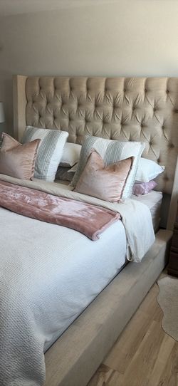 Beautiful Cali King Wingbacked Tufted Bed