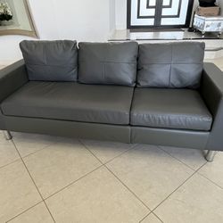 Grey Couch Like New. Barely Used.  Pet Free Smoke Free Home