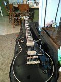 Epiphone black with gold hard ware