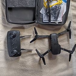 Drone, Remote Control Carrying Case, Charger and Batteries 