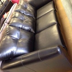Brand new black leather sofa