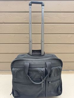 TUMI Alpha Deluxe Rolling Briefcase -Carry On 