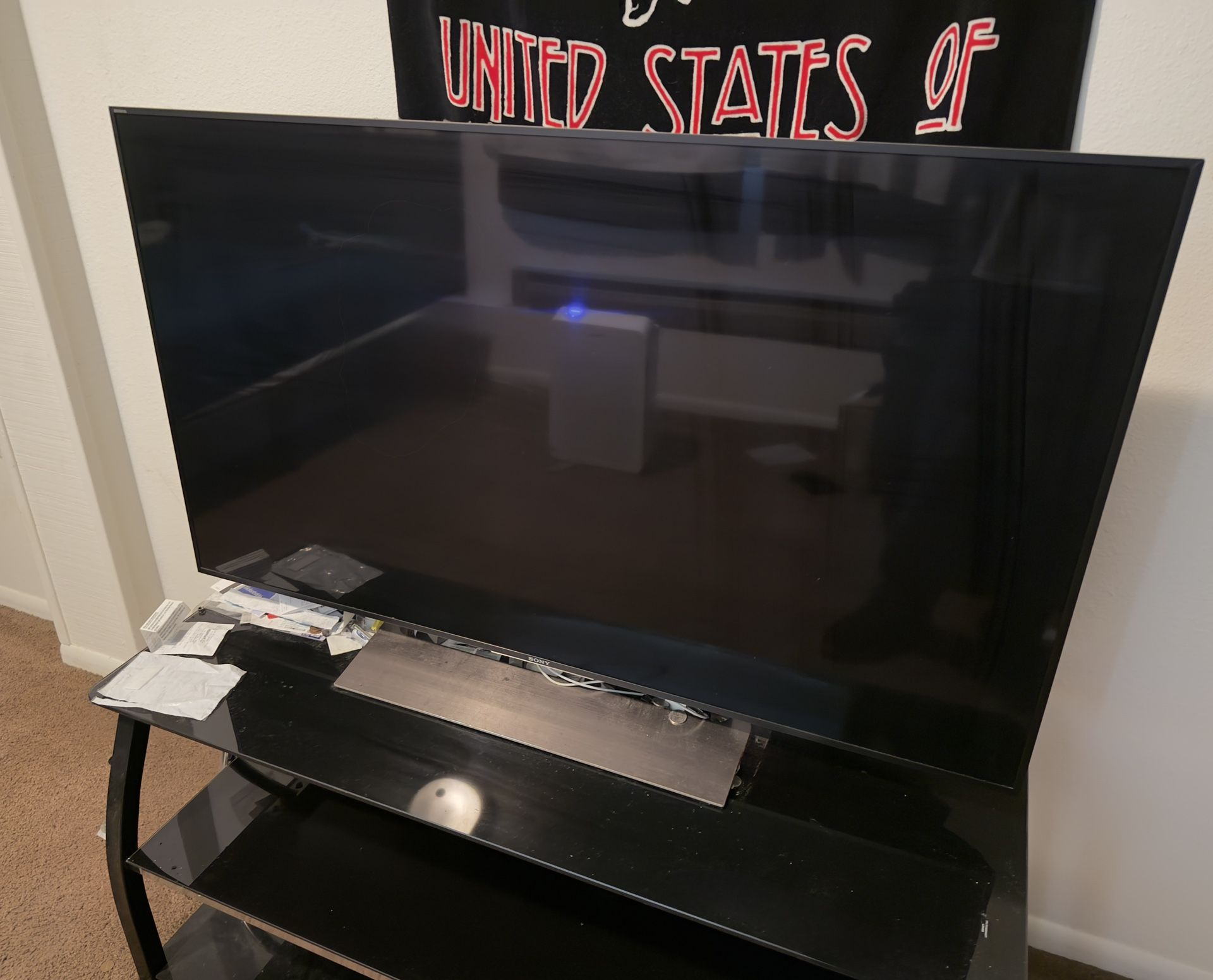 Sony bravia X900E 49” + Tv Stand
