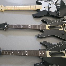 Three Guitar Hero Controllers