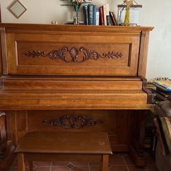 Vintage piano with piano stool included 