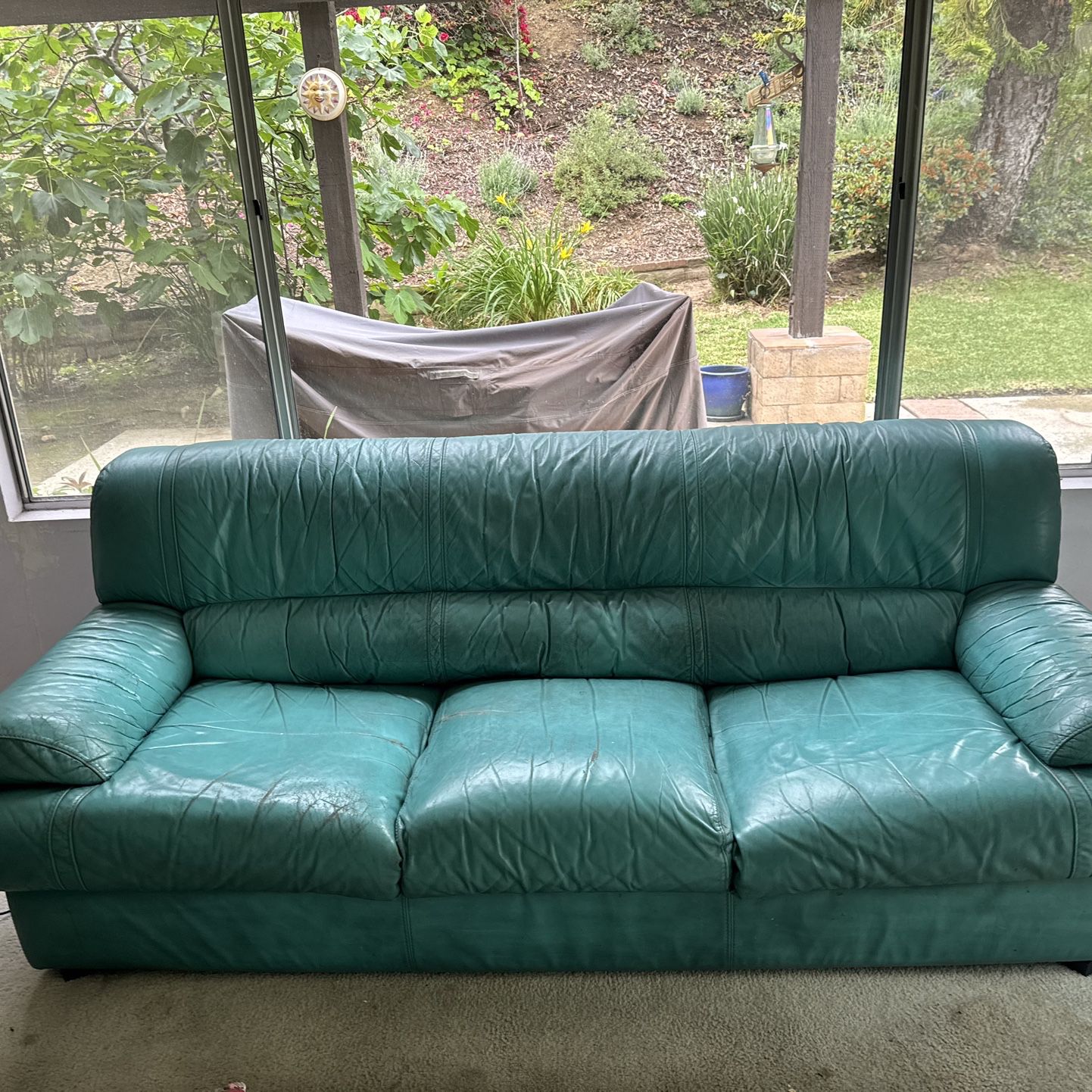 Leather Couch seats three