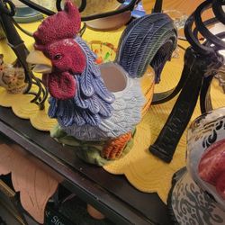 2 rooster pitcher 1 cookie jar ..pair of salt and pepper set
