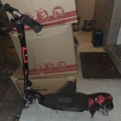 2 Scooters For Sale - 1 Electric and 1 Manual