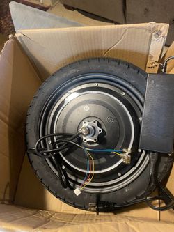 extra Motor spare tire and charger and 1 batteries