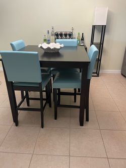 Dining room table with four chairs