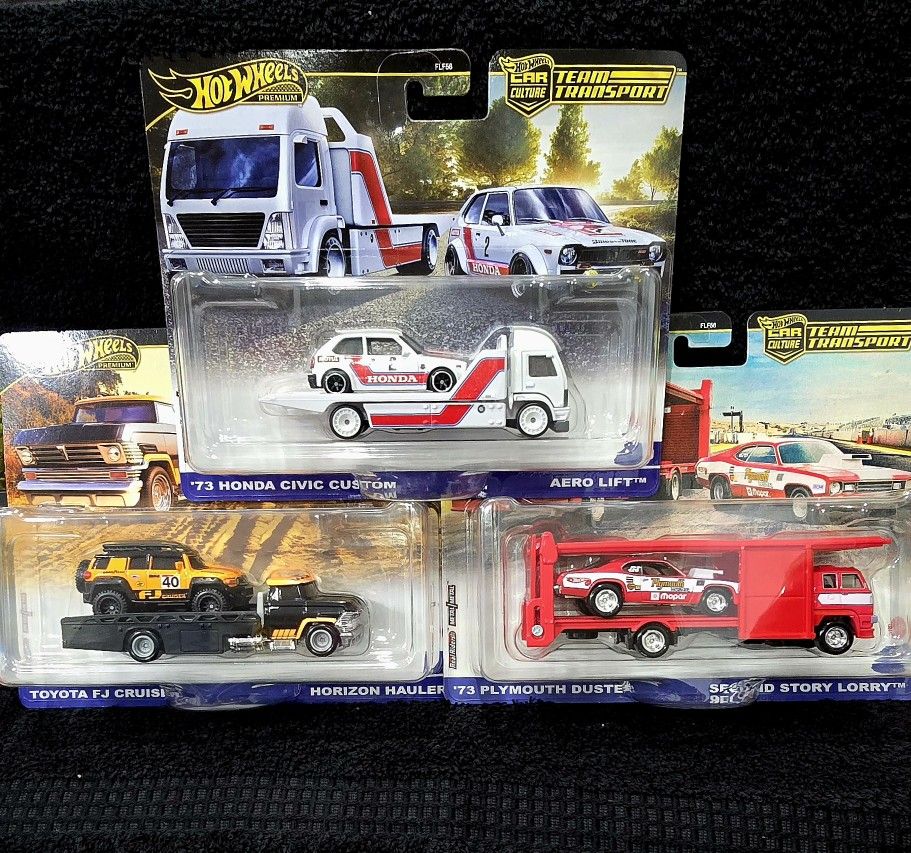Hot Wheels New TRANSPORTER RACE TEAM SET