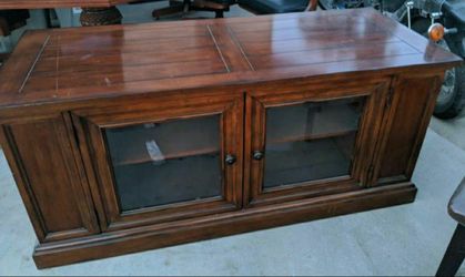 Entertainment center with glass