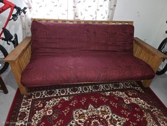 Sturdy wood futon. Full size futon woth mattress.