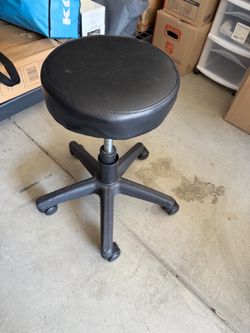 Black Adjustable Rolling Salon/Spa Stool with Wheels.”