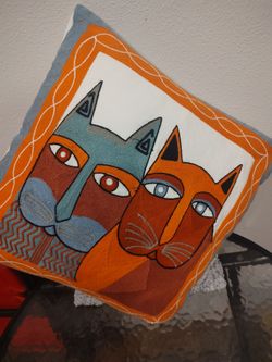 Embroidered cat pillow