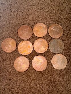 Ten 1oz copper coins