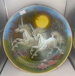 The plate is a vintage collector's item titled "Twice Upon a Time", which is the second plate in the Unicorn Fantasies series by artist K. Chin