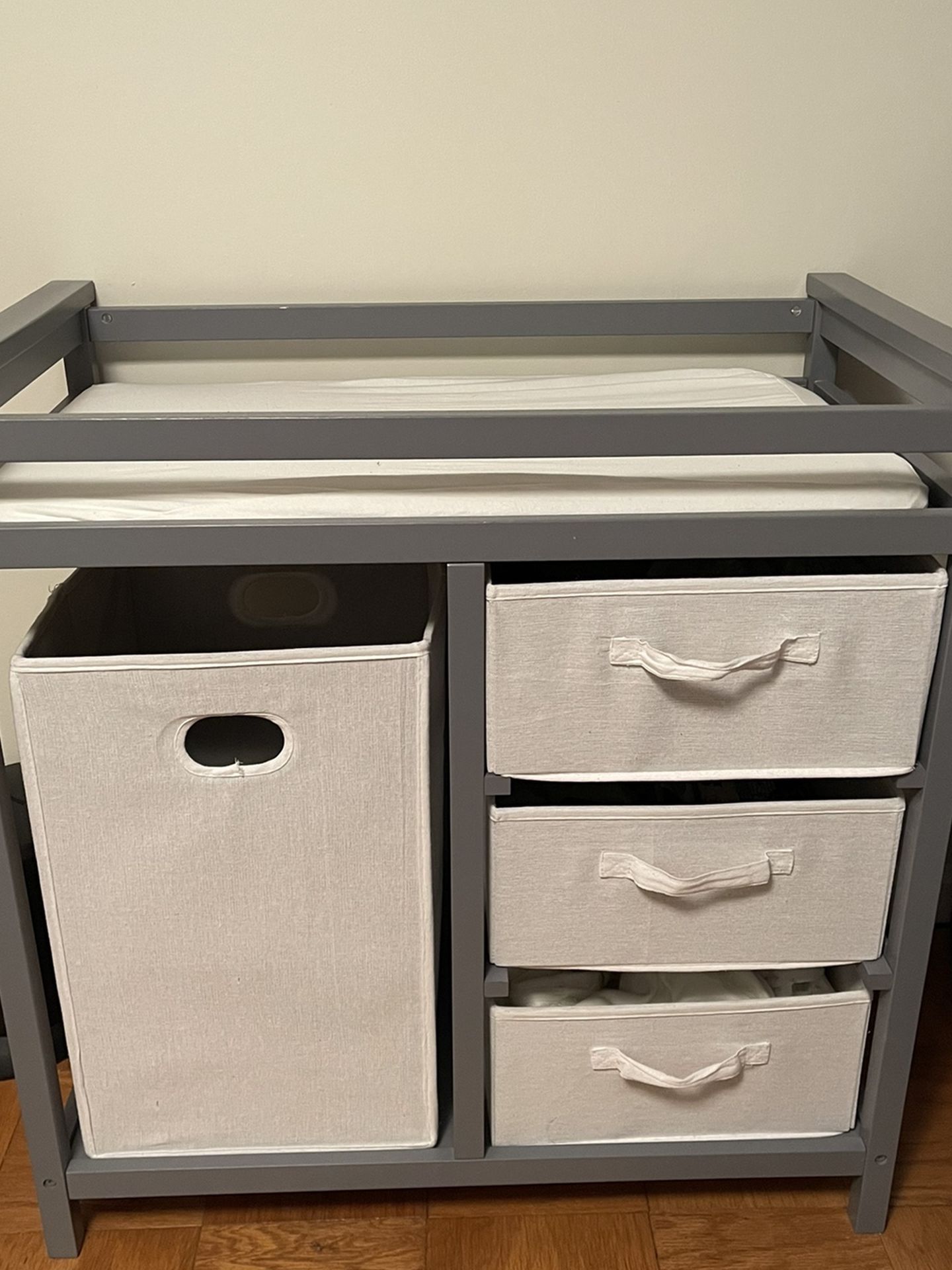 Changing Table With Pad, Hamper & 3 Draws. Pad Cover Included. $45