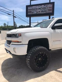 Chevy Silverado lift kit package 📦 rims and tires