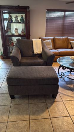 Used chair and ottoman good condition.  Price for both pieces .