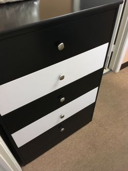 Black and white compressed dresser w/ square knobs