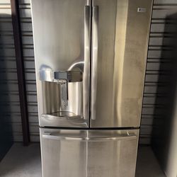 GE Stainless Steel Refrigerator And Freezer
