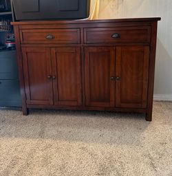 Brown wooden cabinet
