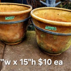 Pair of large plant pots $10 ea.
Made of acrylic foam type of material 