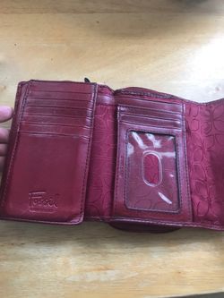 Red leather Fossil wallet