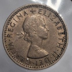 1961 Great Britain Queen Elizabeth II Sixpence Lucky Wedding Coin 23.5mm 2.83g Coin. The coin appears to be in circulated condition, showing wear and 