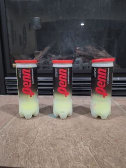 3 cans of tennis balls