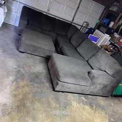 Large Gray Sectional Couch with Ottoman – Good Condition