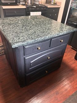 Aisle with marble top & drawers on each side