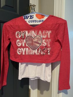 Girl size 10 pink Justice gymnastics top