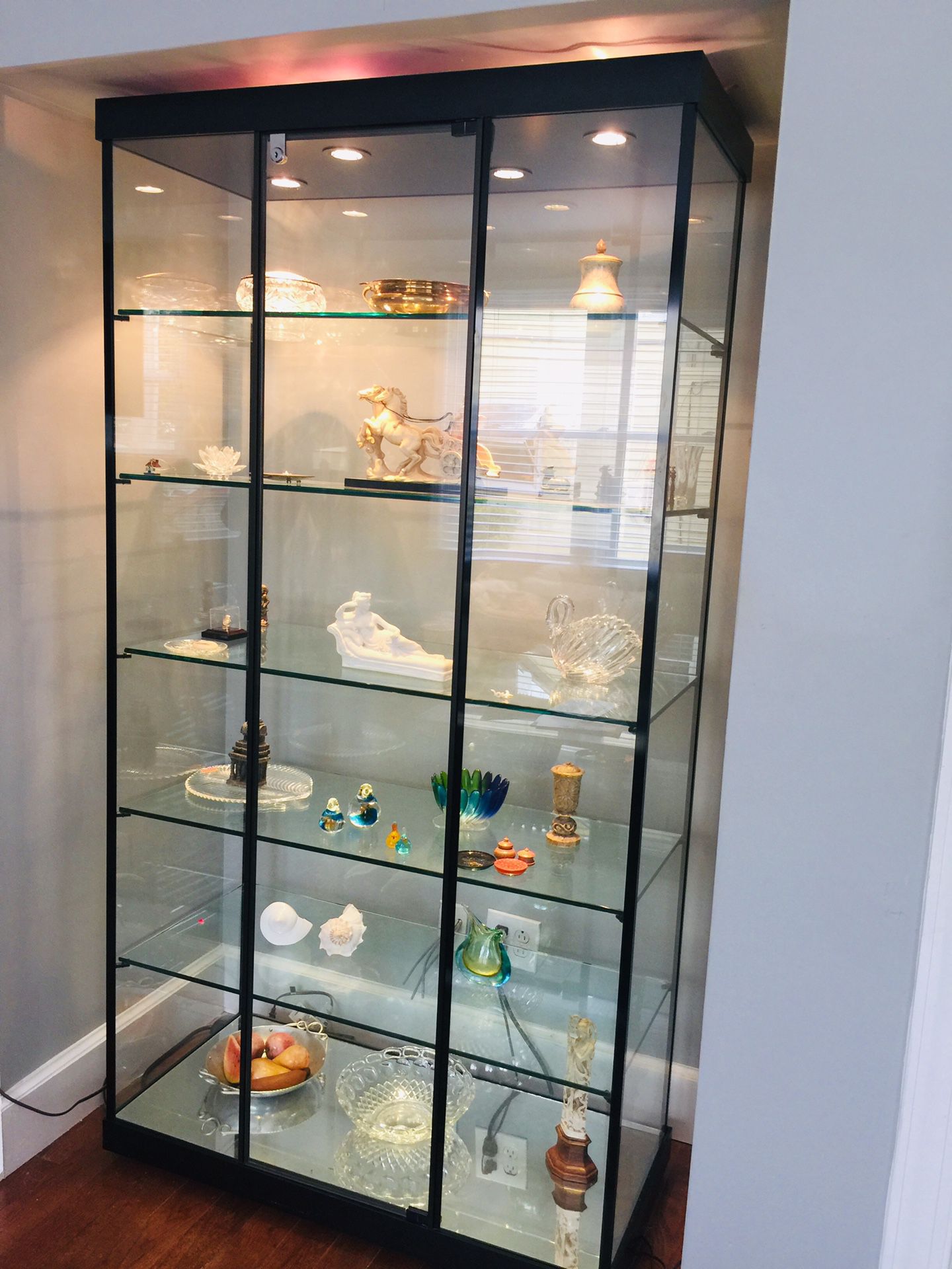 Large Glass Curio Cabinet. Price Drastically Reduced