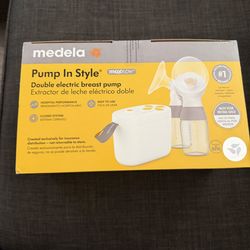 Medela Breast Pump in Style, brand new sealed box