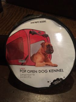 Portable dog kennel . New $20