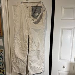 white Columbia Titanium snow pants feature an adjustable waist and grey inner lining large