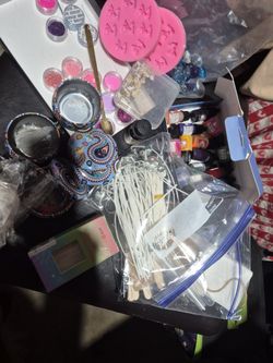 A Box Of Supplies For Candle Making 