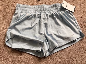 Nike running shorts for women ( M)