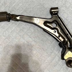 Nissan 54500-85E11 Arm Assembly – Lower (Passenger Side)