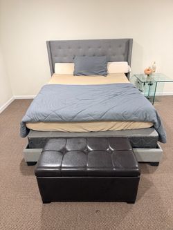 Gray upholstered bed + mattress + storage drawers + ottoman