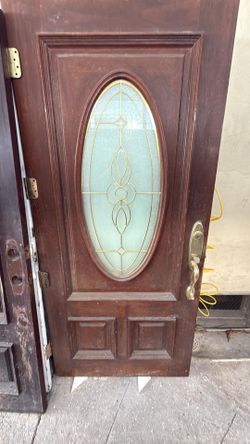 Puerta de madera de exterio 80”x36” ver fotos $ 200