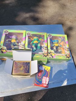Ninja turtles/ gold pokemon cards and ping pong balls