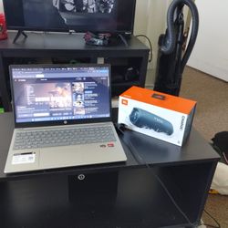 touch screen hp laptop and brand new charge 5 wireless speaker 