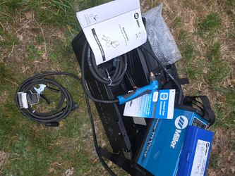 It's a MILLER SPECTRUM 375 X-TREME  and XT 30 TORCH PLASMA CUTTER.