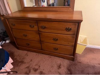Wooden Dresser with mirror/ sold as is