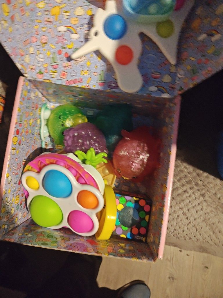 Box With Various Small Toys