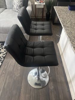Black leather barstools