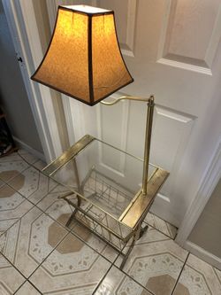 Vintage Mid-century Modern brass and glass side table with lamp 